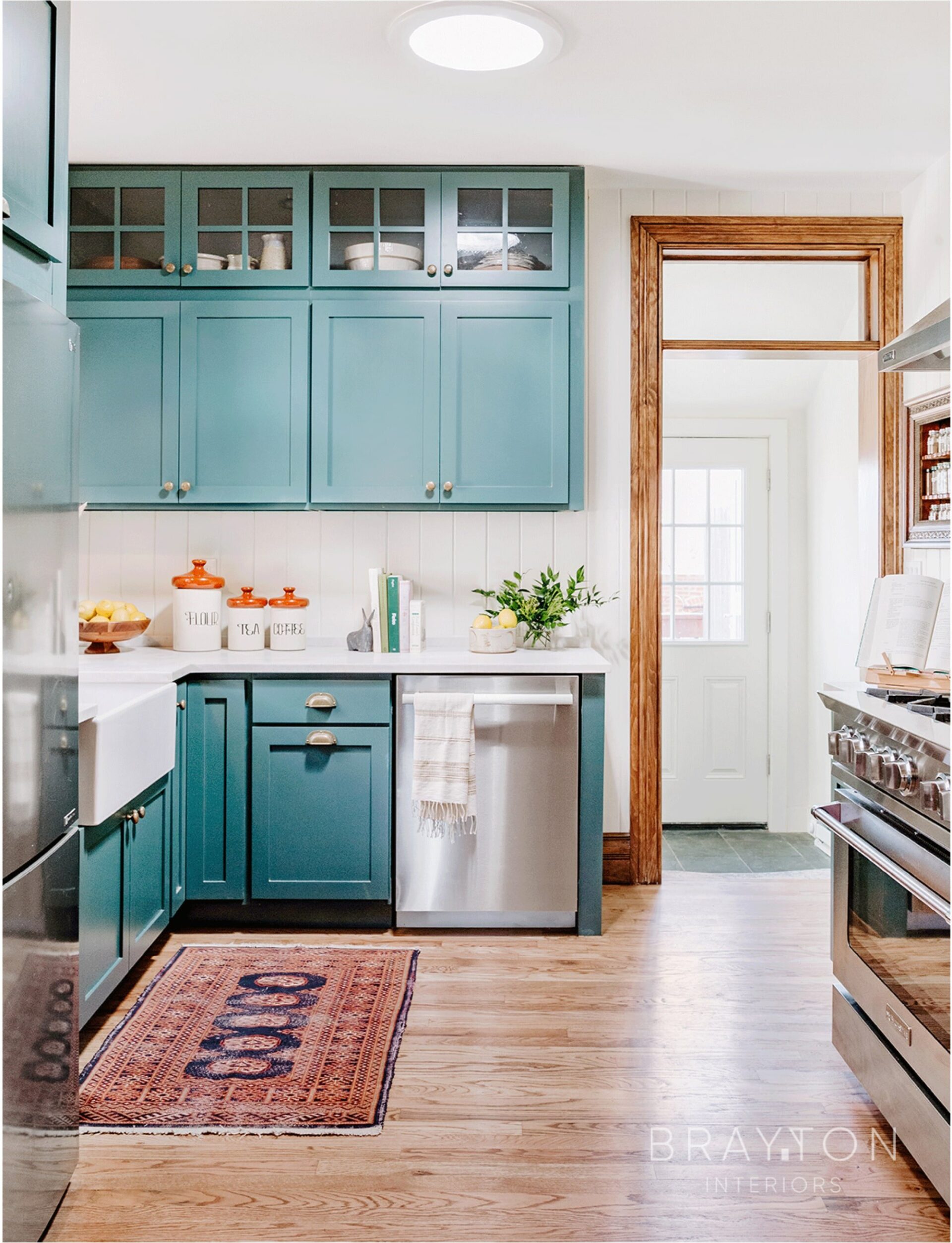 Originally built in 1903, this historic townhome remodel keeps with the original architecture. Featuring classic shaker style cabinetry, real marble countertops and handmade brass hardware.