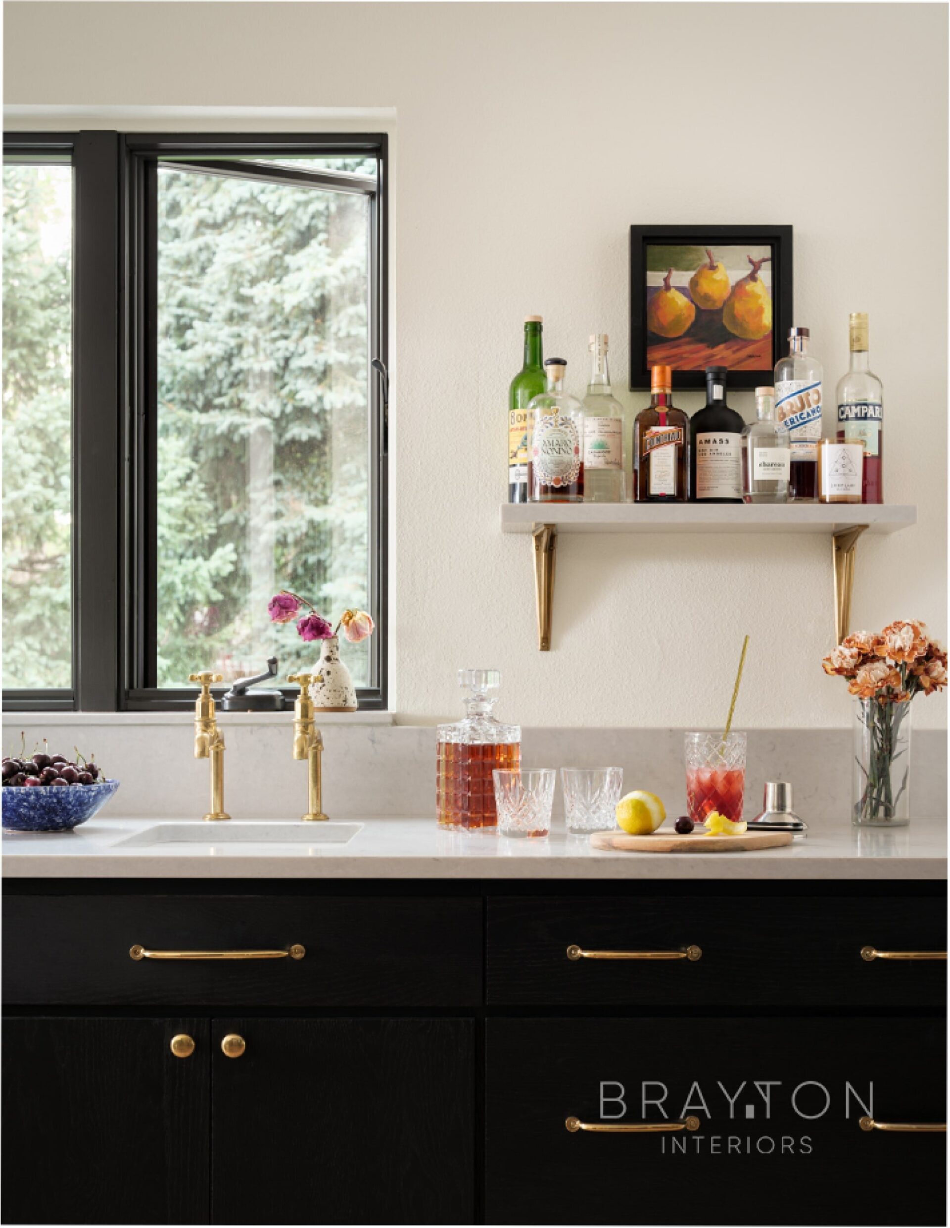 The bar sink features an antique brass faucet that patinas over time, so it only gets better with age.